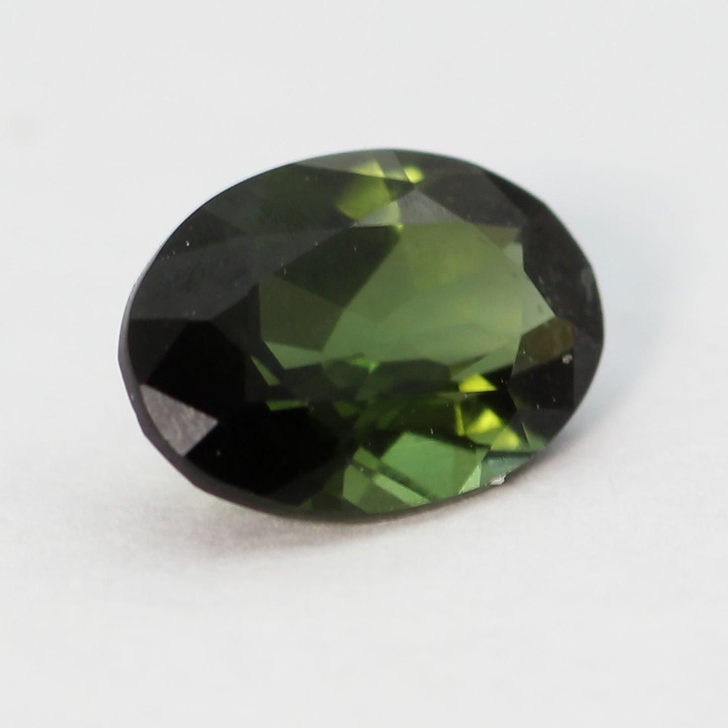 oval cut faceted green tourmaline 0.73 ct