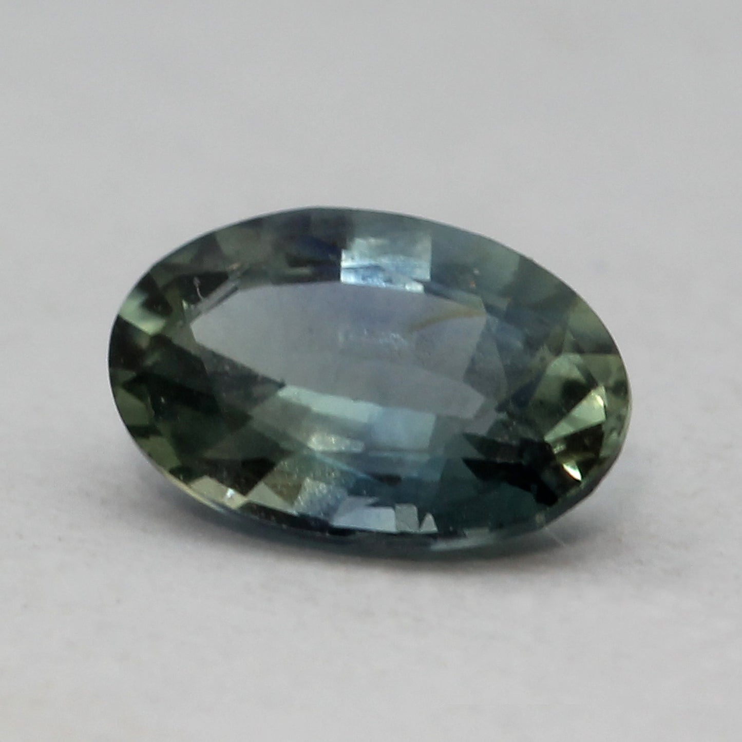 oval cut PAIR of teal sapphires 1.05 ct (0.55ct each)