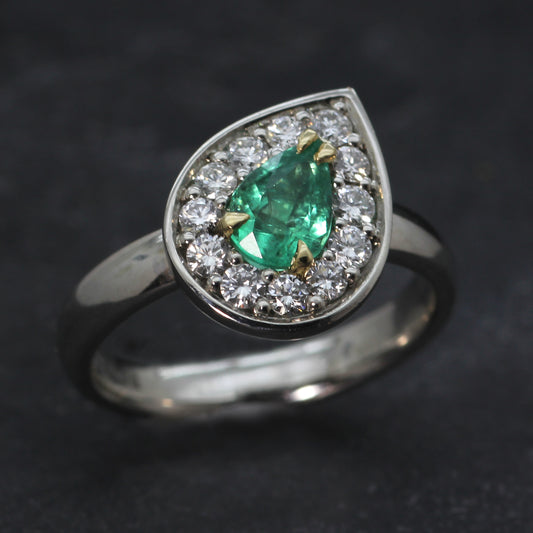 Platinum, Emerald and Diamond Halo ring