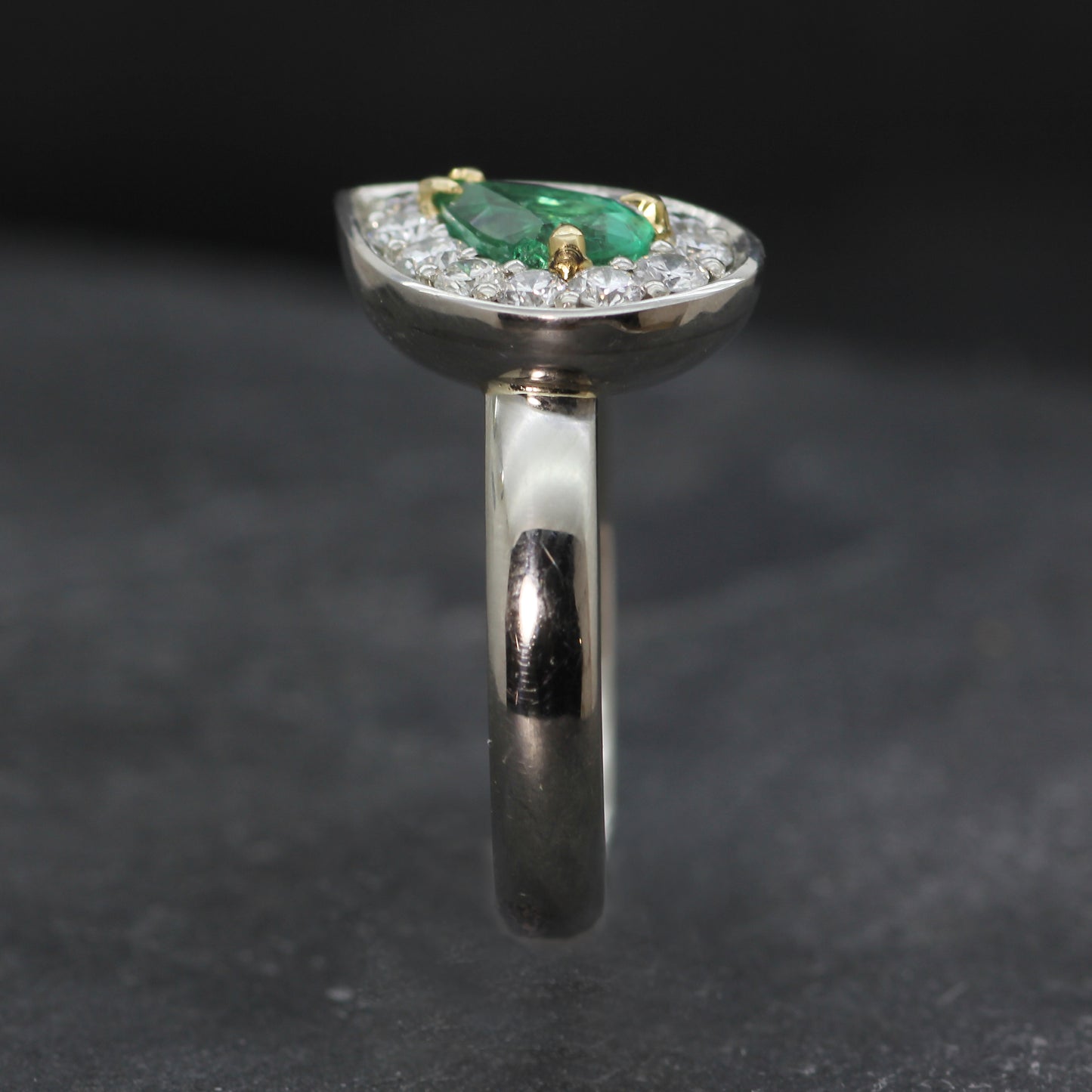 Platinum, Emerald and Diamond Halo ring