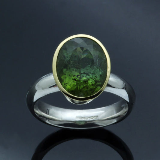 OVAL CUT BRAZILIAN TOURMALINE SET IN 18CT YELLOW GOLD & STERLING SILVER