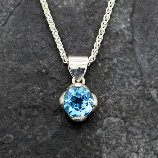 ROUND BRILLIANT BLUE TOPAZ STERLING SILVER FLOWER NECKLACE