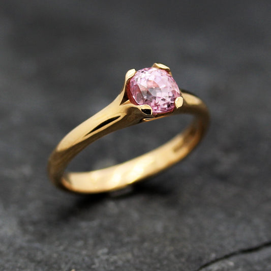 PINK SAPPHIRE SET IN ROSE GOLD FLOWER ENGAGEMENT RING