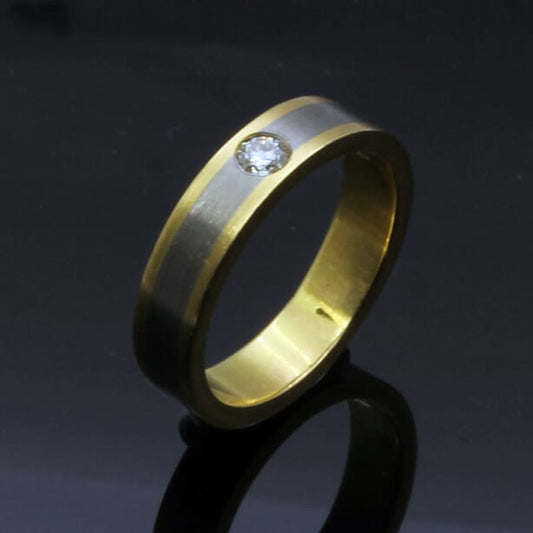 ROUND BRILLIANT DIAMOND SET IN 18CT WHITE GOLD & 18CT YELLOW GOLD