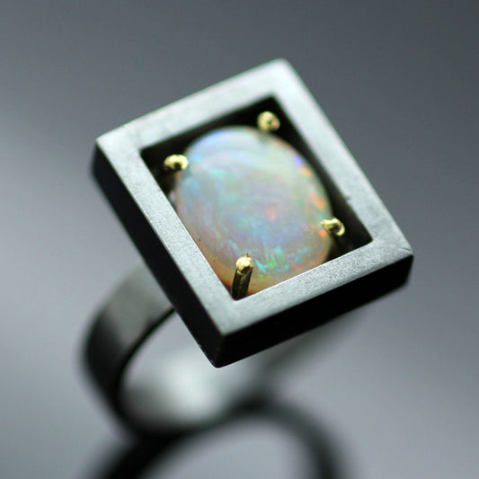 CABOCHON CUT 1.73CT OPAL SET IN 18CT YELLOW GOLD & OXIDISED STERLING SILVER RING