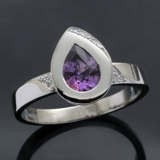 PEAR CUT PURPLE SAPPHIRE & DIAMONDS SET IN PLATINUM RING