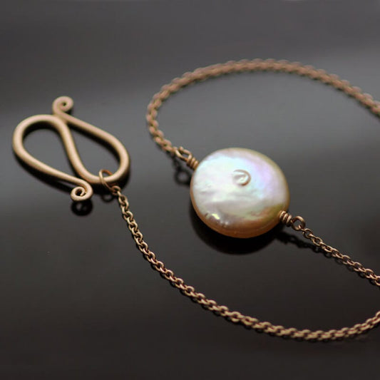 SOFT PINK BUTTON PEARL & 9CT ROSE GOLD BRACELET