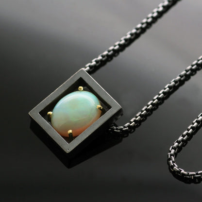 CABOCHON CUT 4.23CT OPAL SET IN 18CT YELLOW GOLD & STERLING SILVER PENDANT