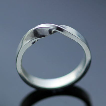 STERLING SILVER MOBIUS TWIST FLAT WEDDING BAND