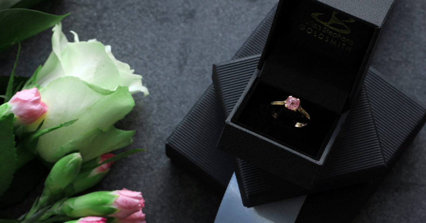 PINK SAPPHIRE SET IN ROSE GOLD FLOWER ENGAGEMENT RING