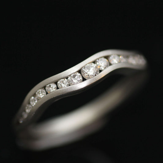 DIAMONDS SET IN PLATINUM RUSCELLO HALF ETERNITY BAND