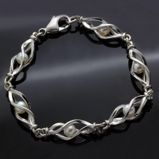 OCEAN CAGE AKOYA WHITE PEARL SET IN STERLING SILVER SCULPTED CAGE BRACELET