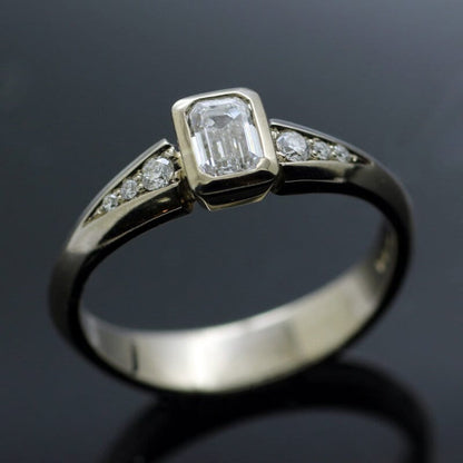 EMERALD CUT 0.41CT DIAMOND SET IN 14CT WHITE GOLD VILLAN ENGAGEMENT RING