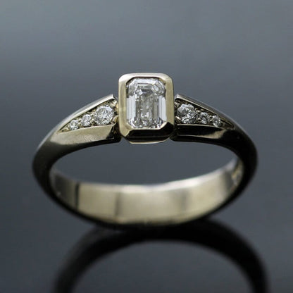 EMERALD CUT 0.41CT DIAMOND SET IN 14CT WHITE GOLD VILLAN ENGAGEMENT RING