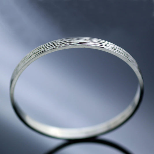 WHEATGRASS STERLING SILVER TEXTURED FLAT BANGLE